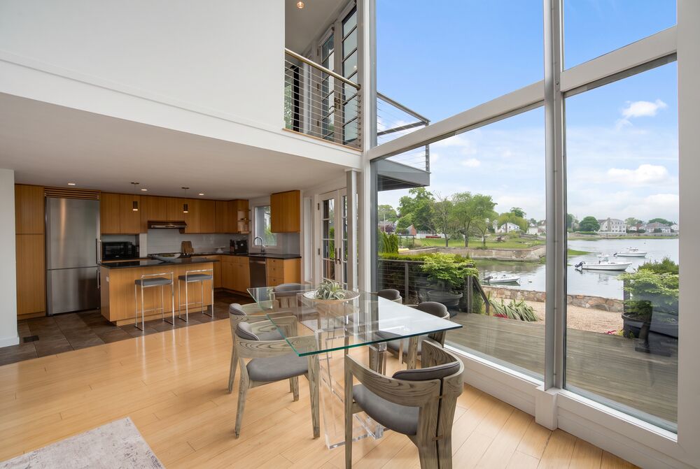 casual dining — double-height glass · harbour light
